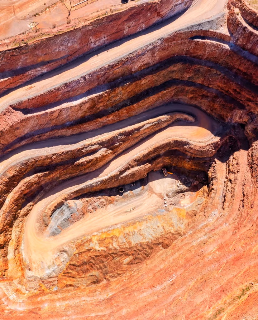 Open-cut mining operation in Australia illustrating mining industry analysis, regional economics and economic impact assessments.